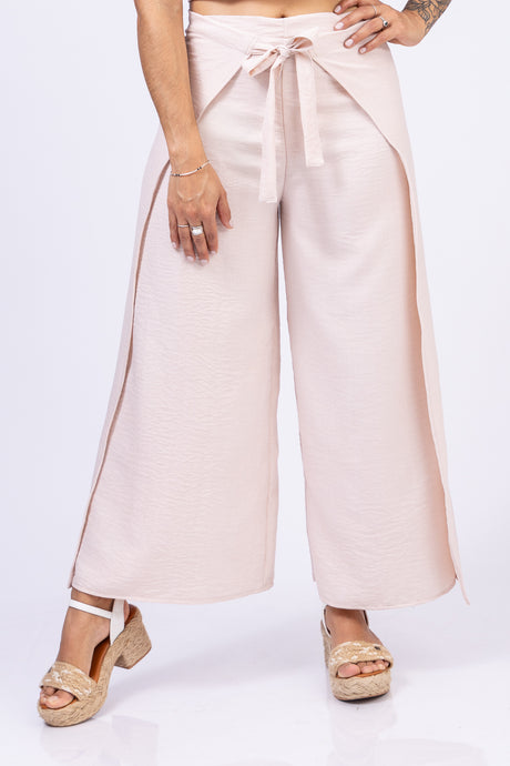 Pantalón con tiras. Color: beige